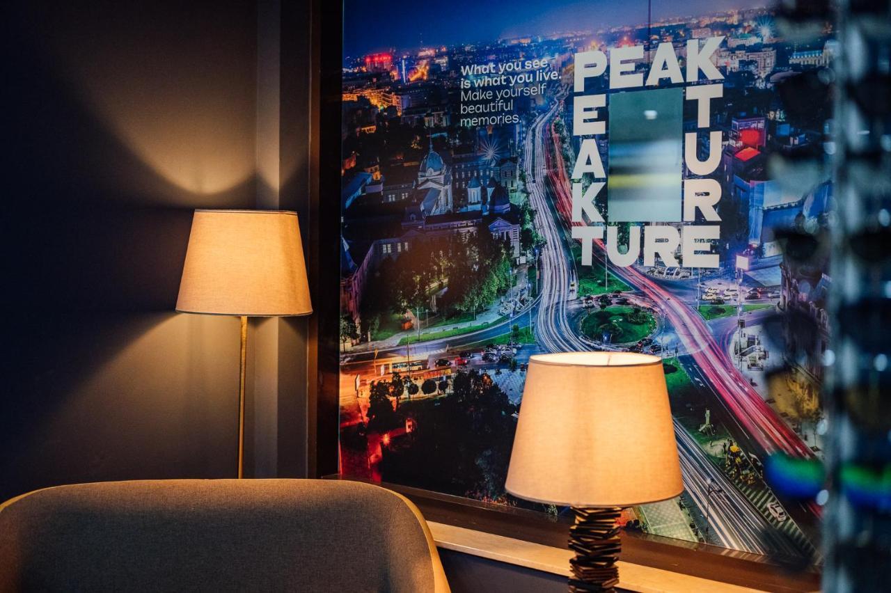 Peakture Hotel Bukares Bagian luar foto
