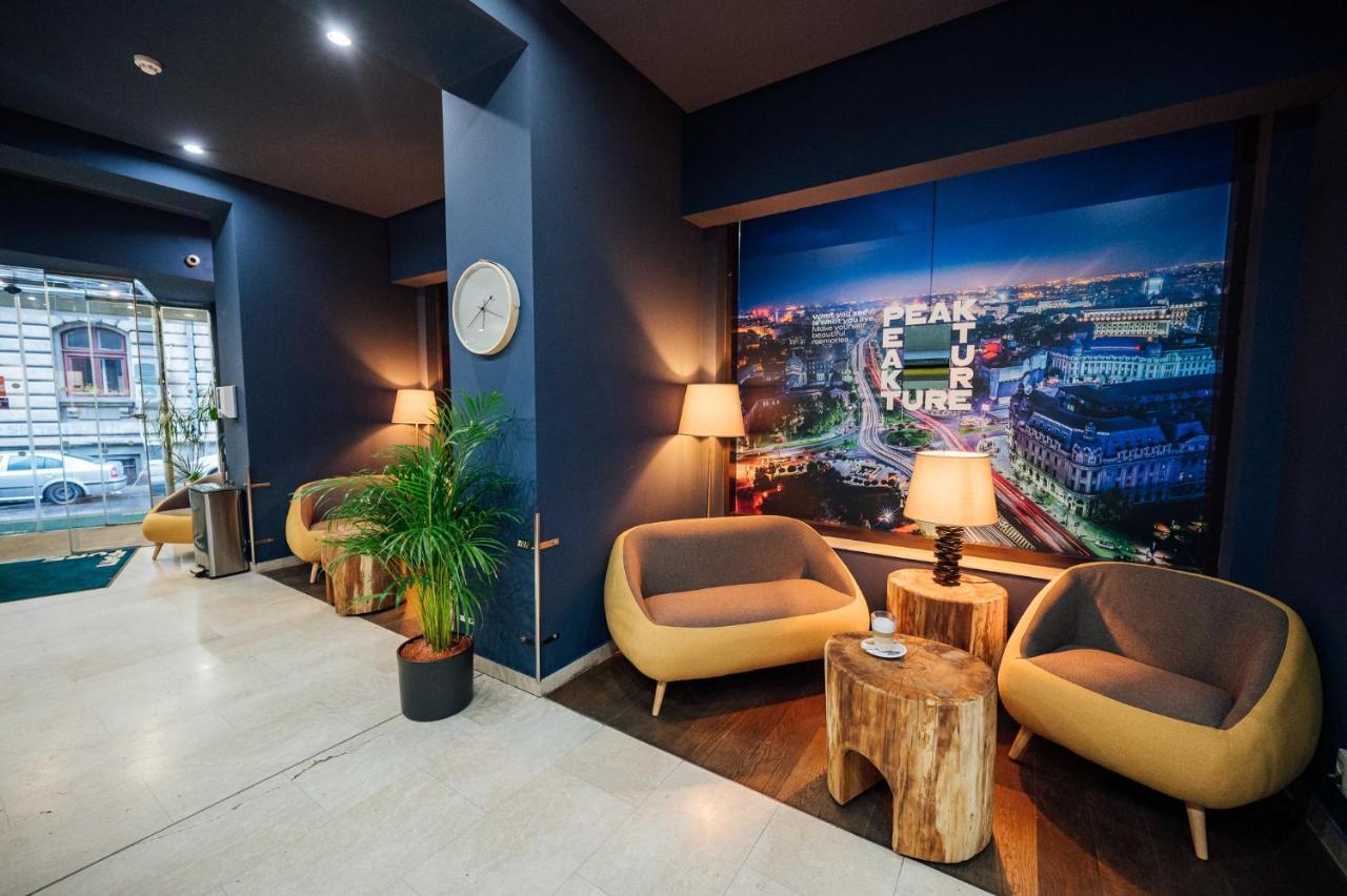 Peakture Hotel Bukares Bagian luar foto